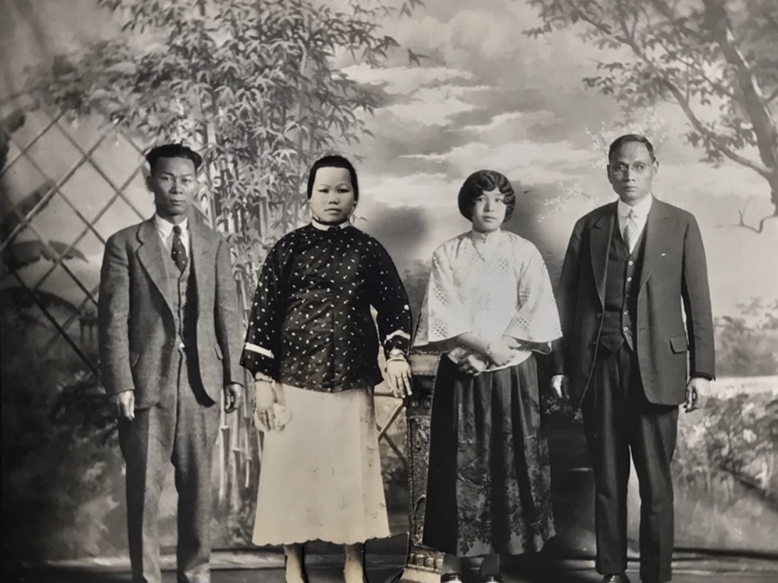 Film still from Vanishing Chinatown. Antique photo collage of Chinese family in a photography studio. 