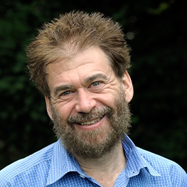 Simon Goldhill in front of a Black Background