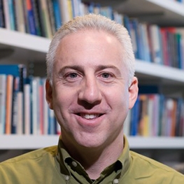 Steven Epstein in front of a Bookshelf