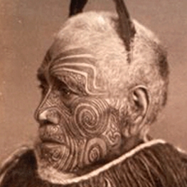 A man with painted/tattooed face 